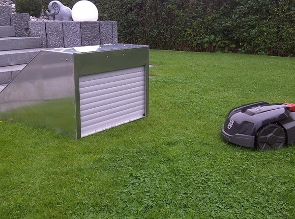 Robotic lawn mower garage with rolling shutter