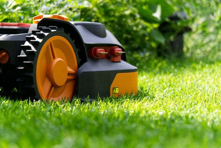 Robotic lawn mower and lawn care